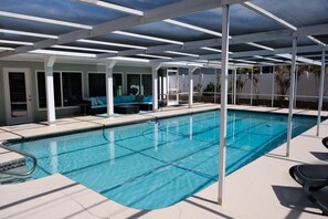 Outdoor pool, a heated pool - Spacious, Modern 3x2 House at Indian Rocks Beach with a Heated Salt Pool! (Seminole)