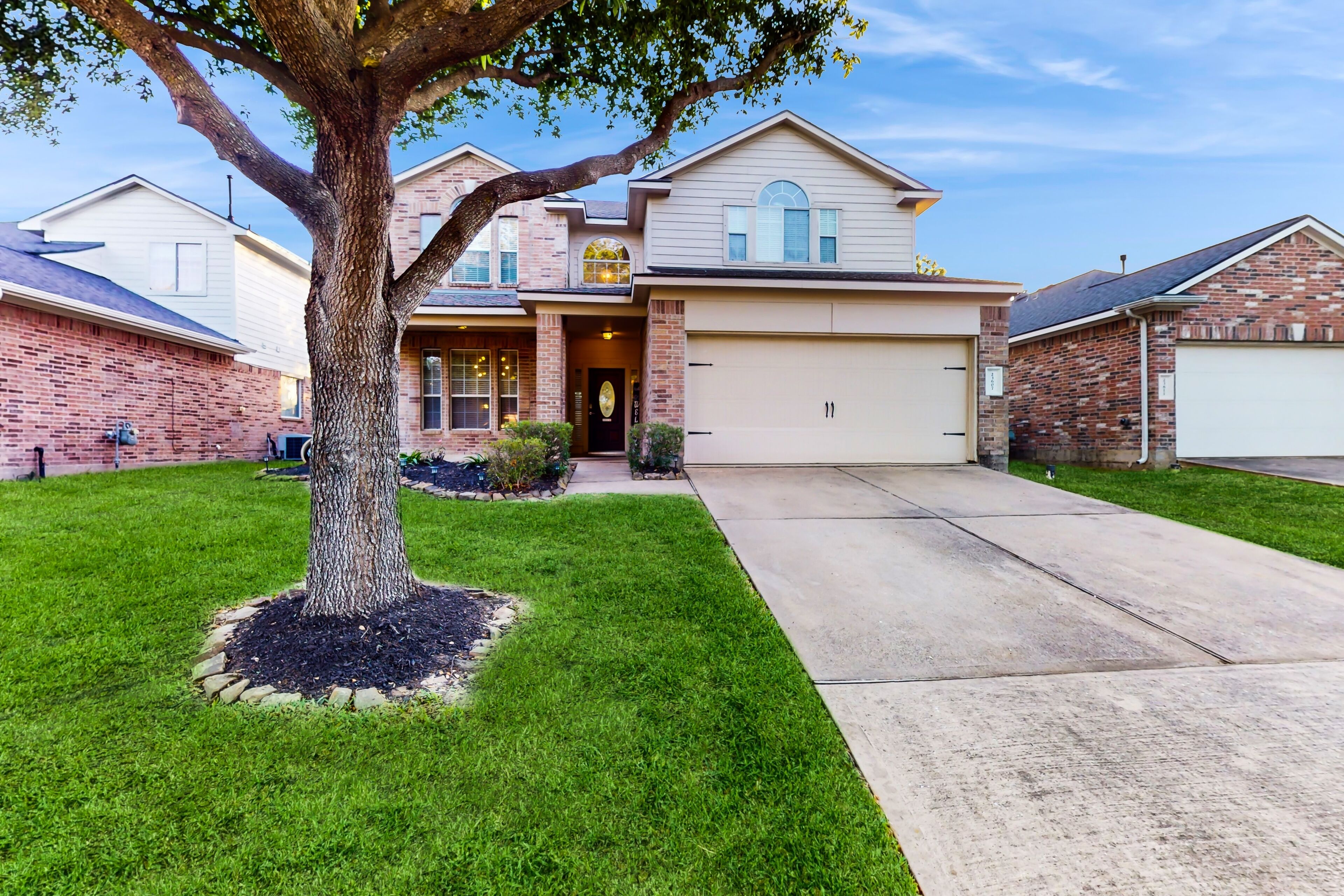 2-story home with enclosed backyard, pool table, firepit, cornhole, office, W/D