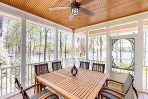 Outdoor dining - Lakefront home with private dock, kayaks, beach, badminton, firepit, & deck (Mineral)