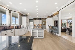 Fridge, microwave, oven, stovetop - Palmetto Sunset - Lux 5BR Mediterranean-Style Home w/ Private Pool (North Myrtle Beach)