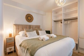 2 quartos, berço de viagem, Wi-Fi, roupa de cama