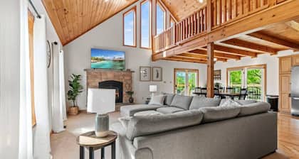 Unwind under the stars by the crackling campfire or indulge in relaxation in the bubbling hot tub. Embrace the essence of togetherness and create unforgettable memories in this inviting haven.