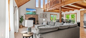 Unwind under the stars by the crackling campfire or indulge in relaxation in the bubbling hot tub. Embrace the essence of togetherness and create unforgettable memories in this inviting haven.