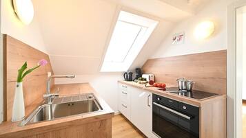 Refrigerador, horno, placa de cocina, lavavajillas