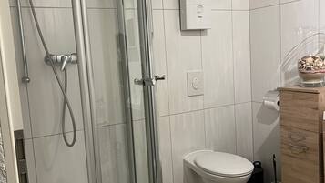 Dusch, hårtork och handdukar