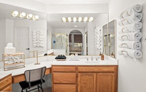 Shower, hair dryer, towels, shampoo
