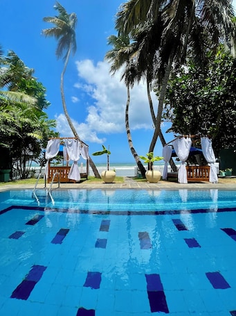 Outdoor pool, pool umbrellas, pool loungers