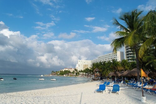 Vacation getaway with beach access & balcony