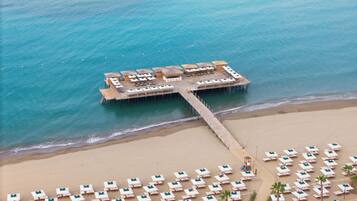Private beach, free beach shuttle, sun-loungers, beach umbrellas