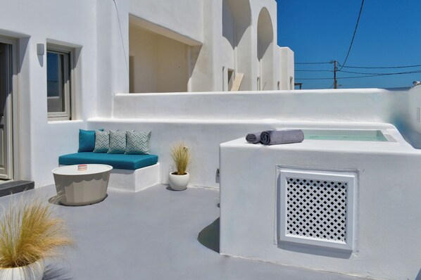 Deluxe Apartment | 4 | Private Hot Tub | Living area | 32-inch LCD TV with satellite channels, Netflix, streaming services