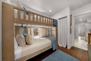 2 bedrooms, desk, iron/ironing board, travel crib