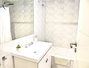 Hair dryer, bidet, towels, soap