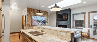 Downtown Penthouse with Elevator and Covered Parking!