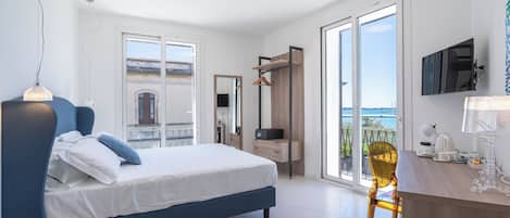Deluxe Room, Balcony, Sea View | 1 bedroom, premium bedding, down duvets, minibar