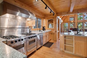 Fridge, microwave, oven, stovetop - Book a Holiday Stay! Ski-in/Ski-out Big Mountain Home! Hot Tub and Sauna! (Whitefish)