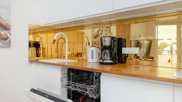 Apartment, 1 Bedroom, Balcony | Private kitchen | Fridge, oven, stovetop, dishwasher