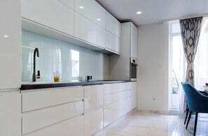 Apartment (A1) | Private kitchen | Oven, electric kettle, toaster