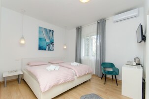 Quarto (S1) | Cofres nos quartos, ferros/tábuas de passar roupa, Wi-Fi de cortesia