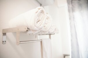 Exclusive Room, Courtyard View | Bathroom | Shower, hair dryer, bidet, towels
