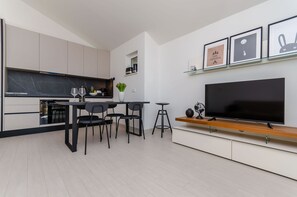 Apartment (A2) | Private kitchen | Fridge, microwave, oven, stovetop - Apartments Kiwi (Trogir)