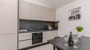 Apartment (A2) | Private kitchen | Oven, electric kettle, toaster