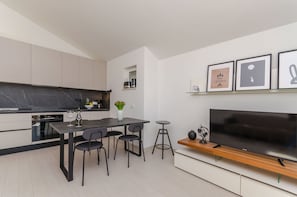 Apartment (A2) | Private kitchen | Fridge, microwave, oven, stovetop