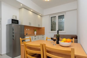 Apartment (A7) | Private kitchen | Fridge, microwave, stovetop, electric kettle