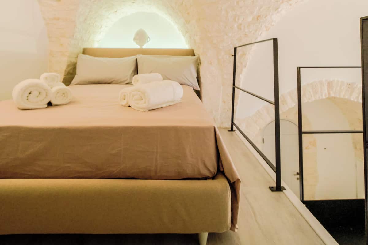 Hypo-allergenic bedding available, down comforters, minibar