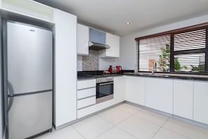Superior Apartment, 2 Bedrooms, City View | Private kitchen | Full-size fridge, microwave, oven, stovetop