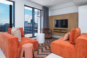 Apartment, 1 Bedroom | Living area | 40-inch flat-screen TV with satellite channels