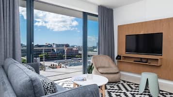 Apartment, 2 Bedrooms | Living area | 40-inch flat-screen TV with satellite channels