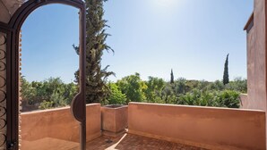 An open balcony with a clear view of greenery and distant buildings. - Luxury villa with swimming pool, not overlooked. (Marrakech)