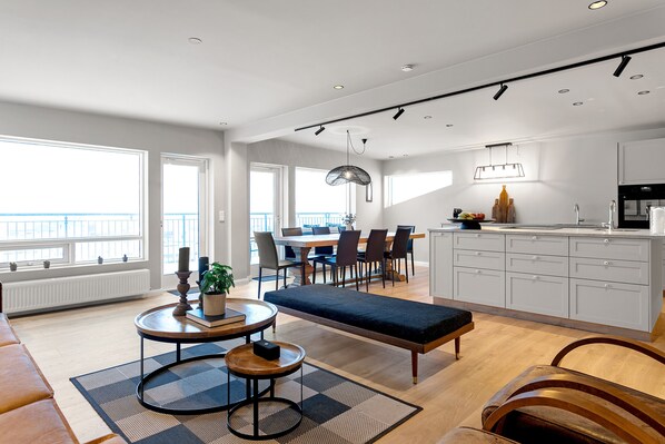 Apartment, 4 Bedrooms | Living area | 50-inch Smart TV with digital channels