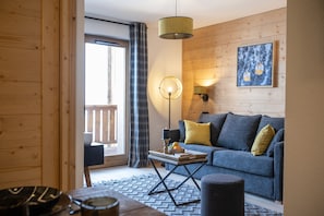 2 rooms for 4 people standard | Living area | 1-inch flat-screen TV with digital channels - TERRESENS - Le Snoroc (Aime-la-Plagne)