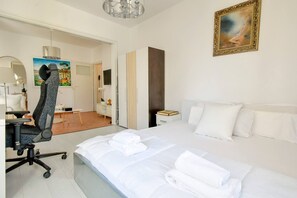 1 dormitorio, tabla de planchar con plancha, wifi gratis y ropa de cama