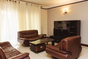 Triple Room | Living area - Highlands Apartment (Kigali)