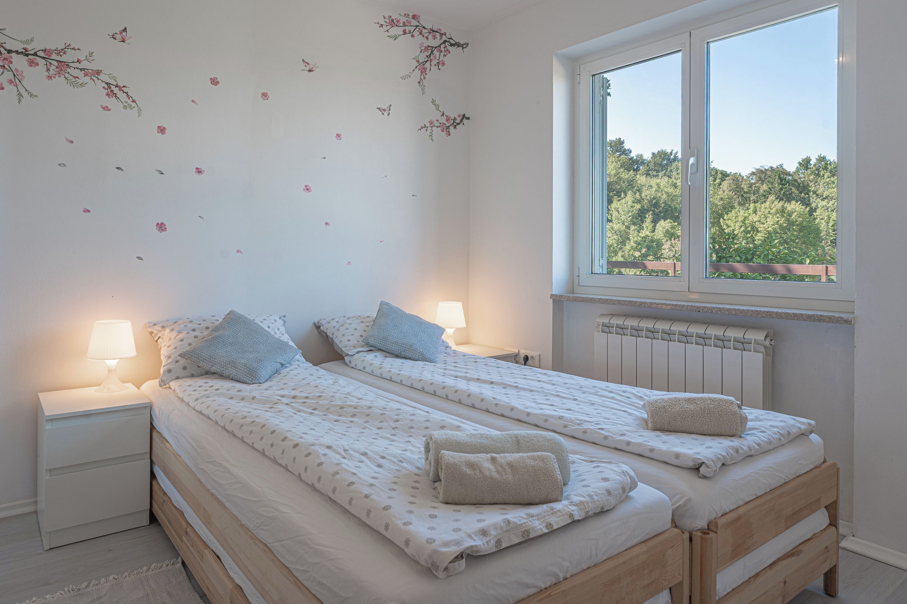 Apartamento familiar, varias habitaciones, 2 baños (Serene Retreat Apartment St. Anton) | 1 dormitorio, tabla de planchar con plancha, wifi gratis y ropa de cama