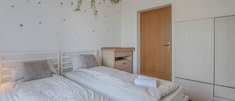 Family Apartment, Multiple Bedrooms, 2 Bathrooms, Mountainside (Serene Retreat Apartment St. Anton) | 1 bedroom, iron/ironing board, free WiFi, bed sheets