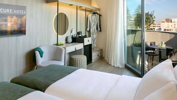 Premium bedding, pillow-top beds, minibar, in-room safe