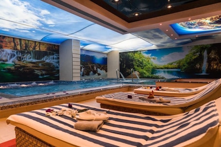 Indoor pool, seasonal outdoor pool, pool umbrellas, sun loungers