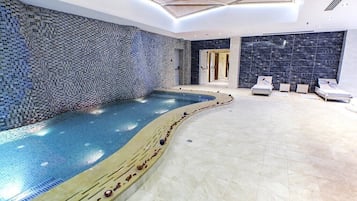 Indoor pool, seasonal outdoor pool, pool umbrellas, sun loungers