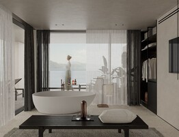 Un baño moderno con una bañera grande, un banco de madera y vistas a un cuerpo de agua.