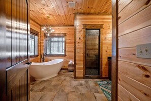 Shower, hair dryer, towels, toilet paper