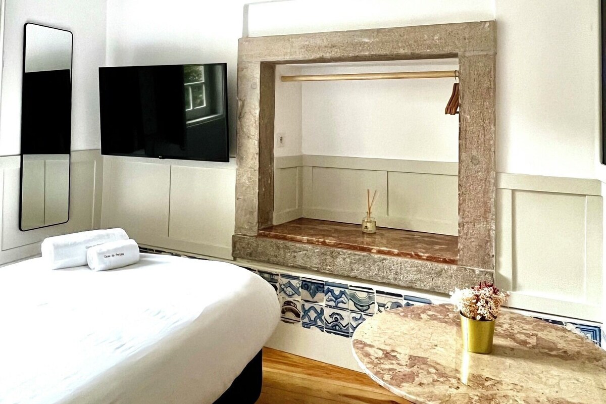 Chambre Économique, 1 grand lit 1 place, vue jardin, dans les dépendances