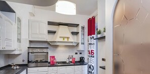 Fridge, oven, electric kettle, cookware/dishes/utensils