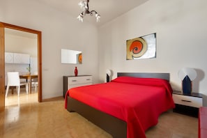 A bedroom with a bed, a nightstand, a dresser, a chair, and a desk. - 3839 La Dolce Casa by Barbarhouse (Melendugno)