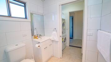 Shower, hair dryer, towels, soap