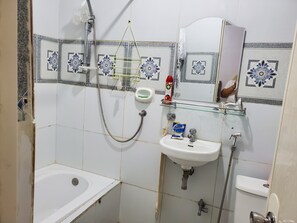 Shower, bidet, towels, soap