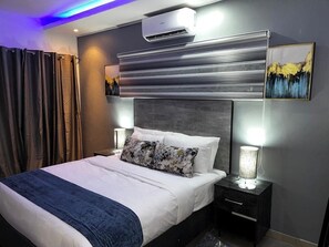 Standard Room, Garden View | 1 bedroom, iron/ironing board, free WiFi