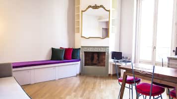 Apartment, 1 Bedroom | Living area | 40-inch flat-screen TV with digital channels